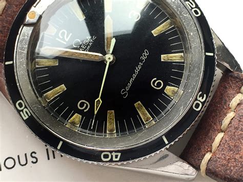 omega seamaster 300 bezel material